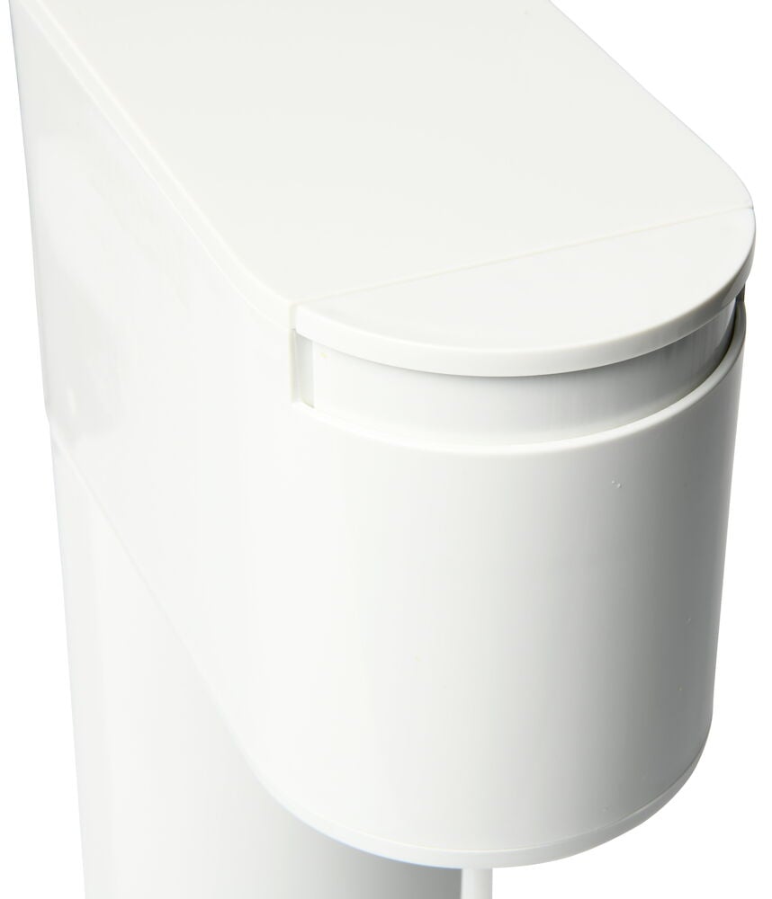 Vit kolsyremaskin med rundad modern design.