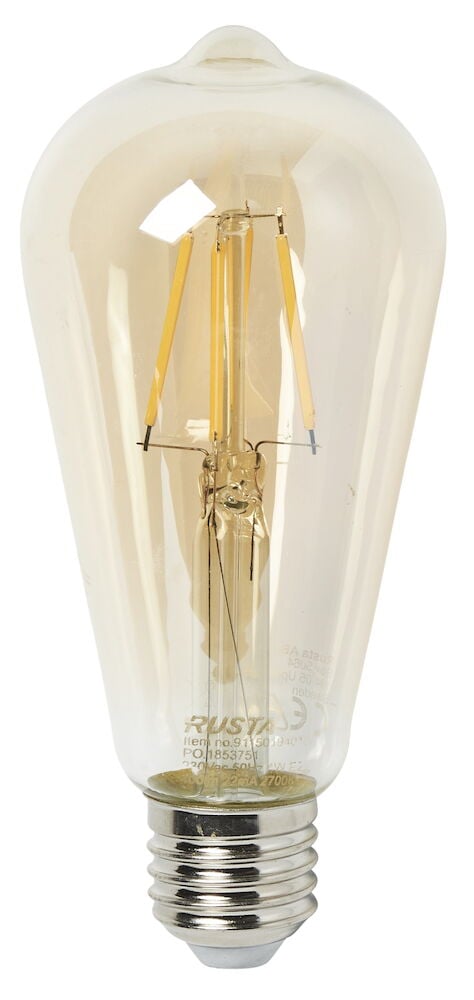 Klar LED-lampa med guldton och synliga filament.