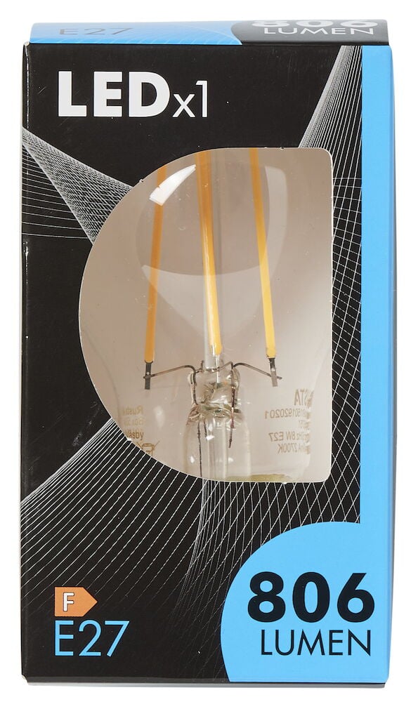 LED-lampa i klar glasglob i förpackning.