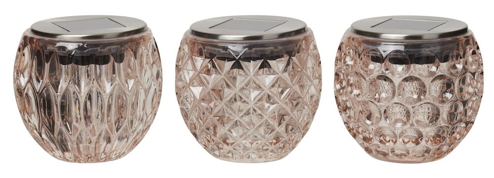 Drei runde Solarleuchten aus gemustertem Glas.