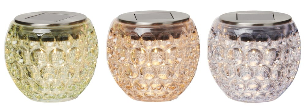 Drei runde Solarleuchten aus gefärbtem Glas.