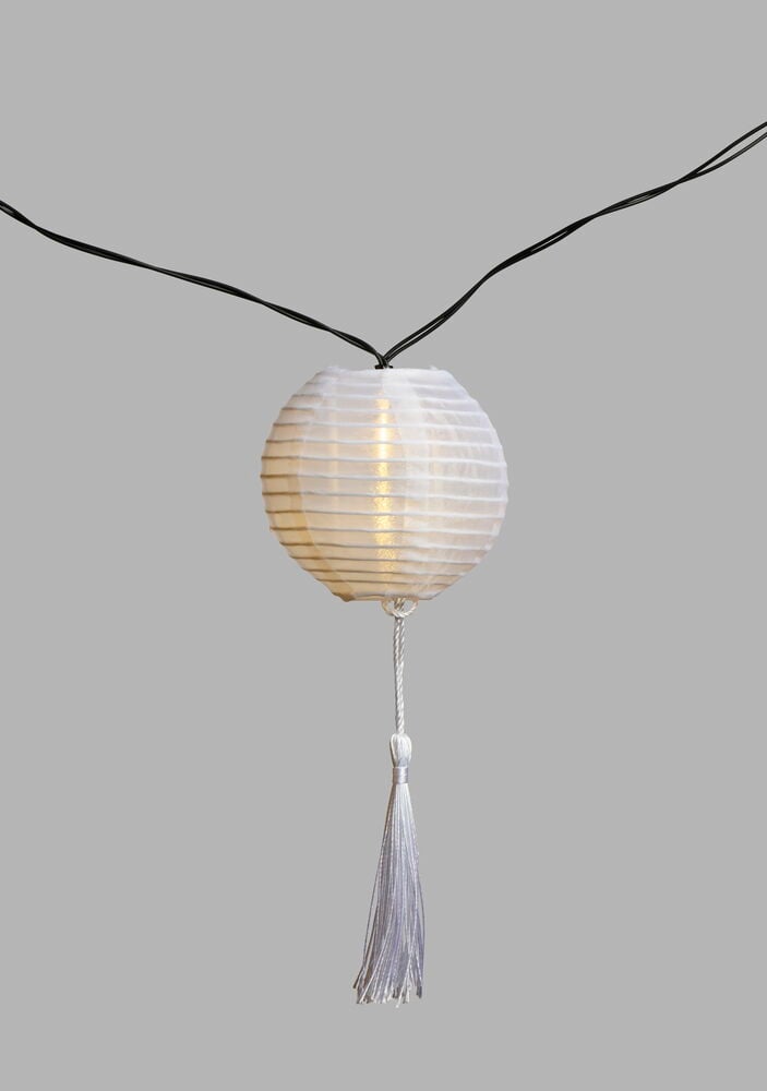 Vit risbollslampa på svart sladd med tofs.