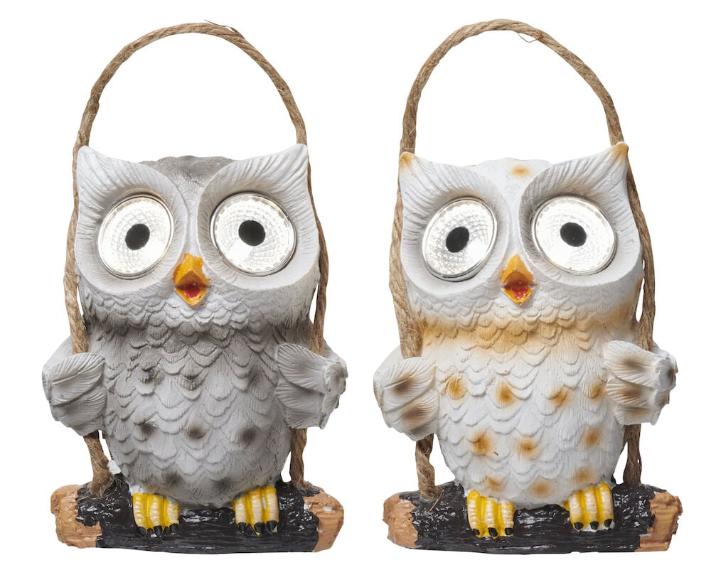 To uggeformede solcellelykter i hvitt og grått.