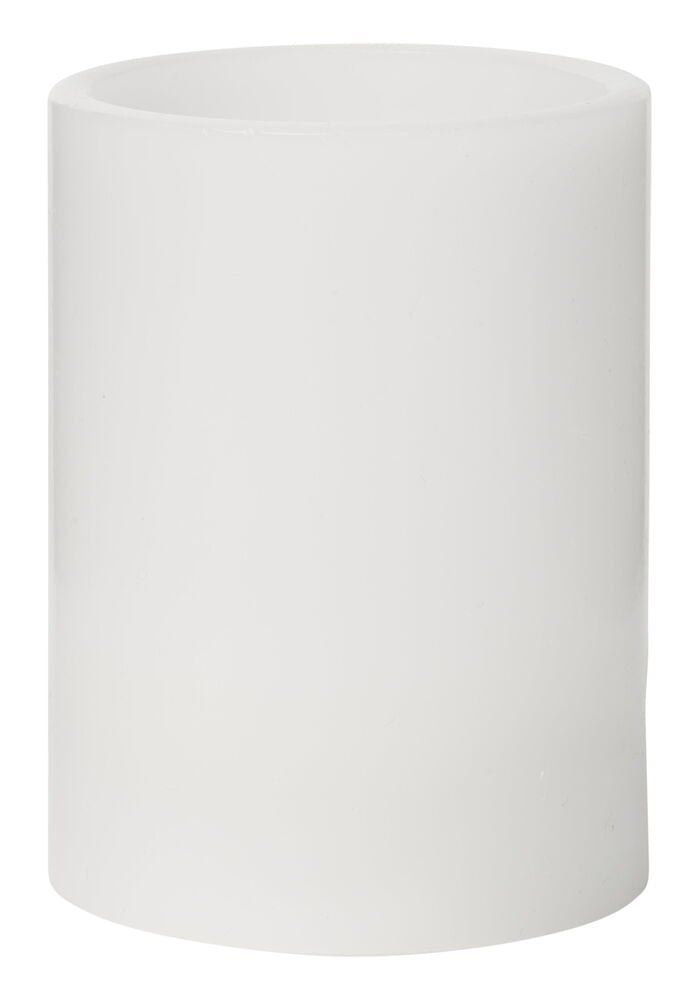 Ett vitt blockljus i vax med rak kant.