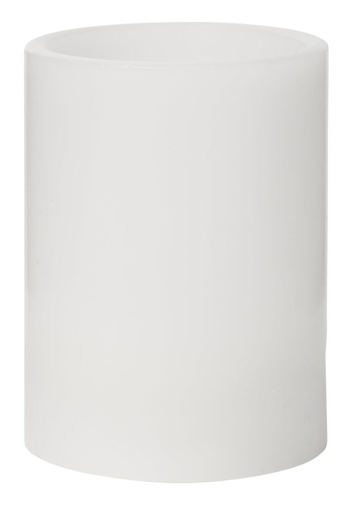 Ett vitt blockljus i vax med rak kant.