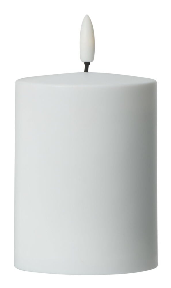 Hvitt blokklys i plast med LED flamme.