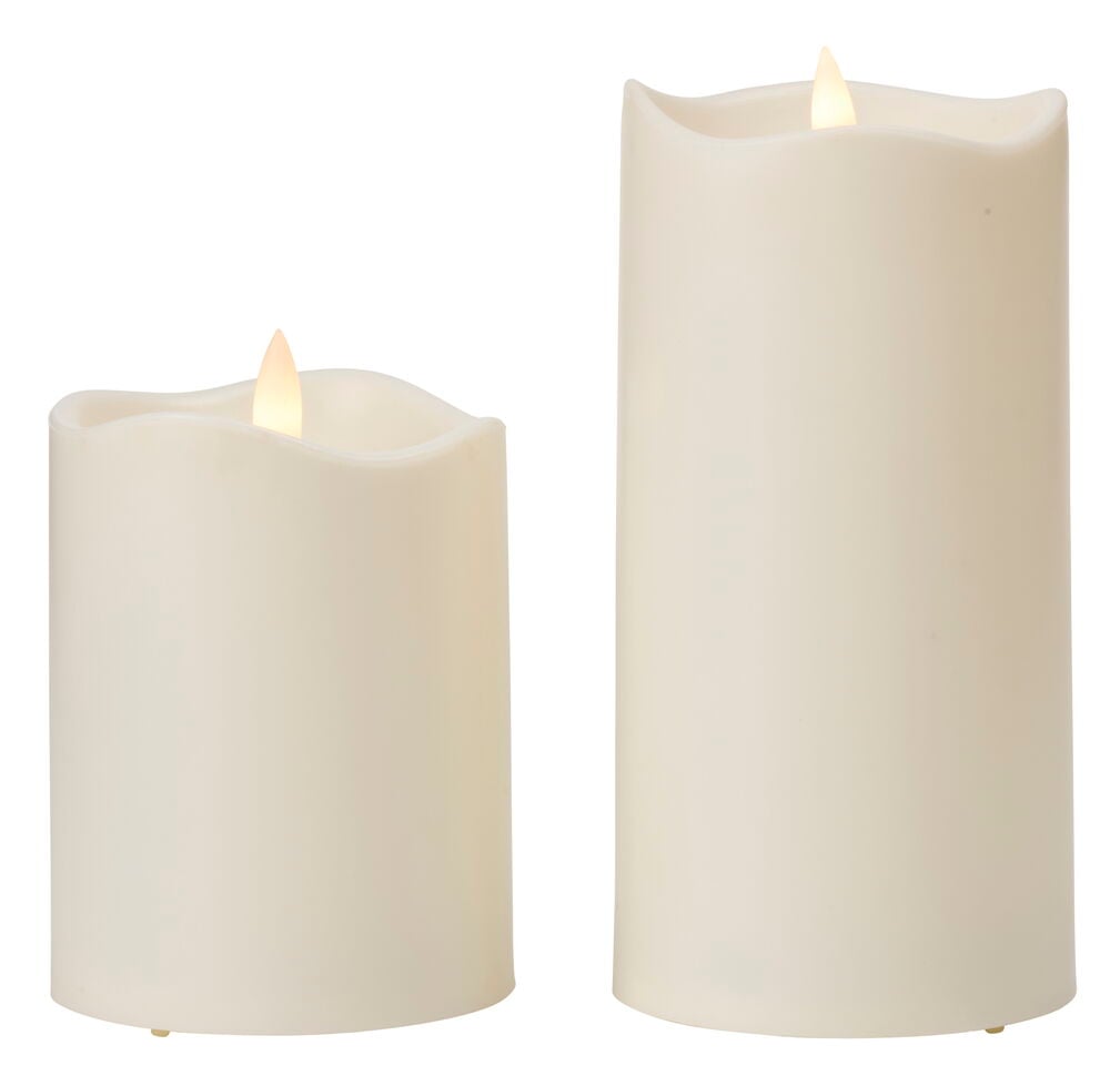 Två vita LED-ljus med flimrande låga.