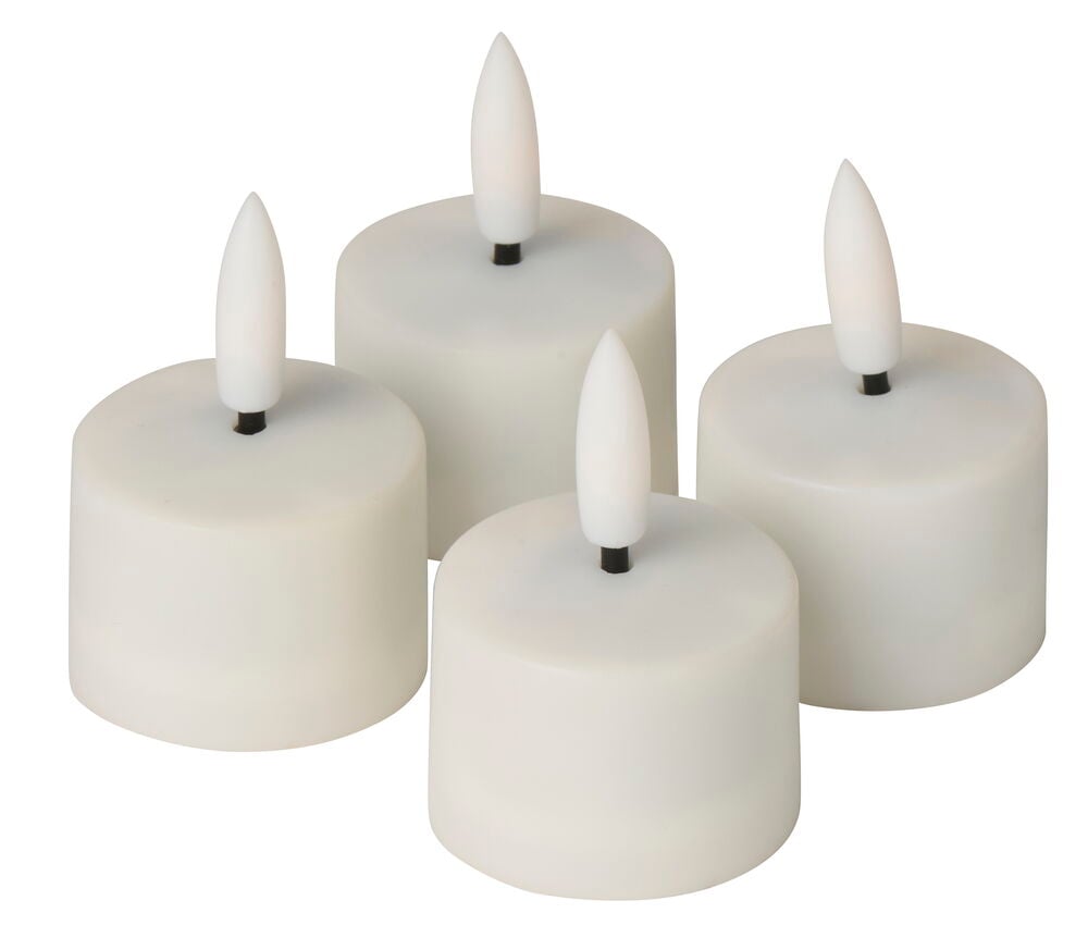 Fyra vita Uppladdningsbara värmeljus LED Ystad 4-pack Utökning till startkit, cylindriska med flamtoppar.