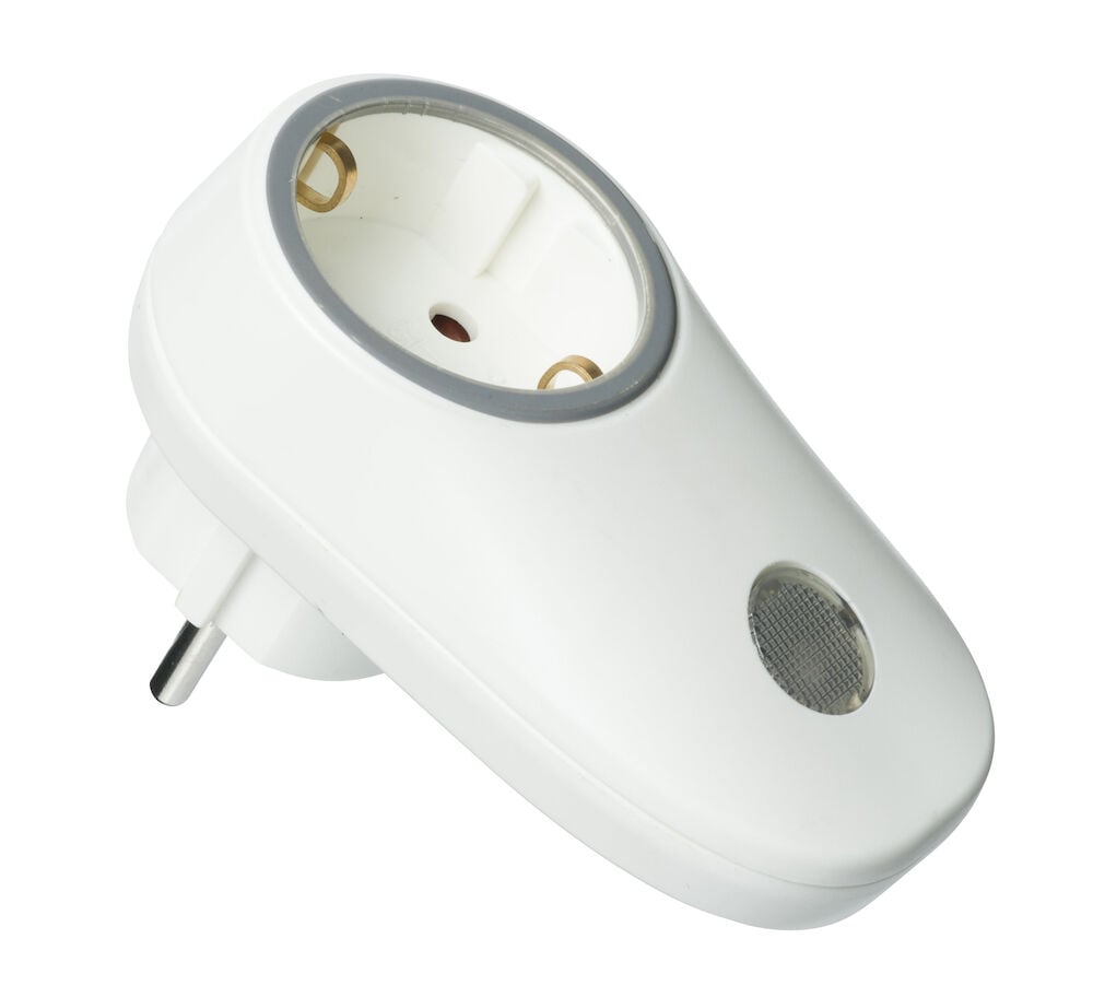 Vit sensoradapter för inomhusbruk med elkontakt.