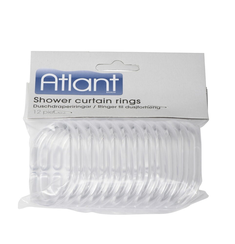 Tolv transparenta duschdraperiringar i plastförpackning.