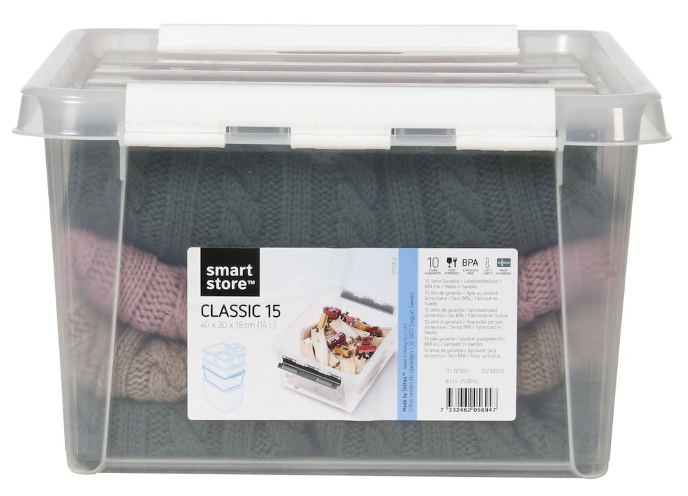 Transparent förvaringslåda med lock innehåller vikta tröjor.