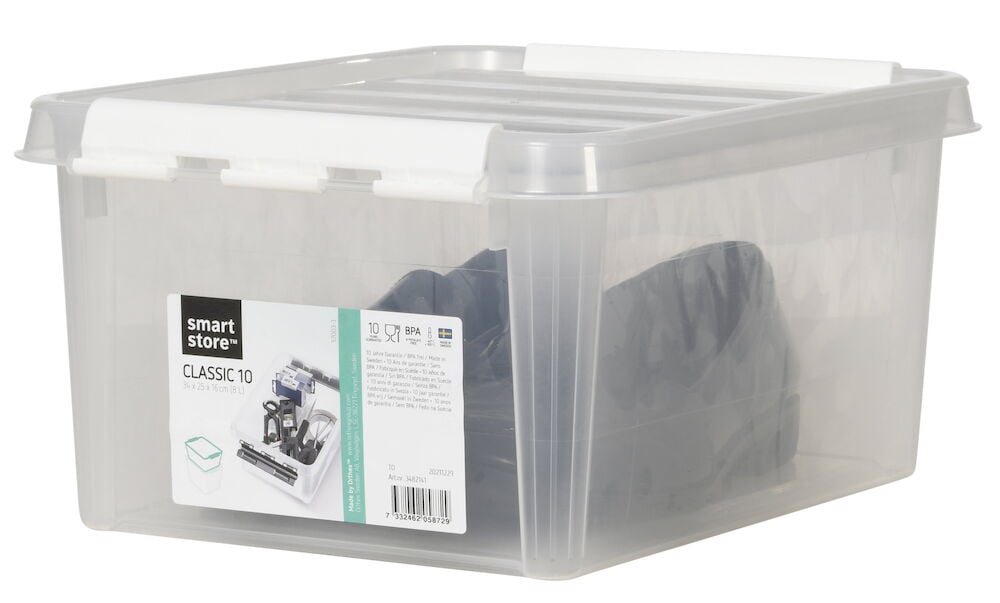 Transparent förvaringslåda med vitt lock och etikett.