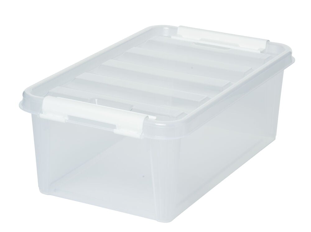 Läpinäkyvä muovilaatikko kannella ja valkoisilla kiinnikkeillä.