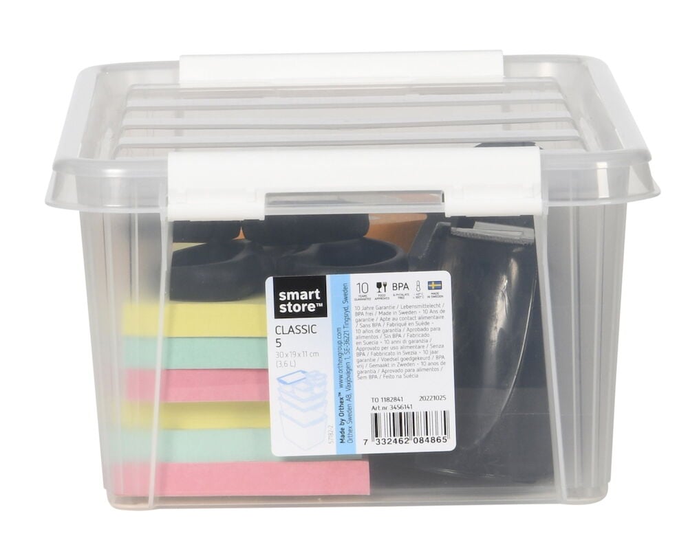 Transparent förvaringslåda med lock och färgglada lappar.
