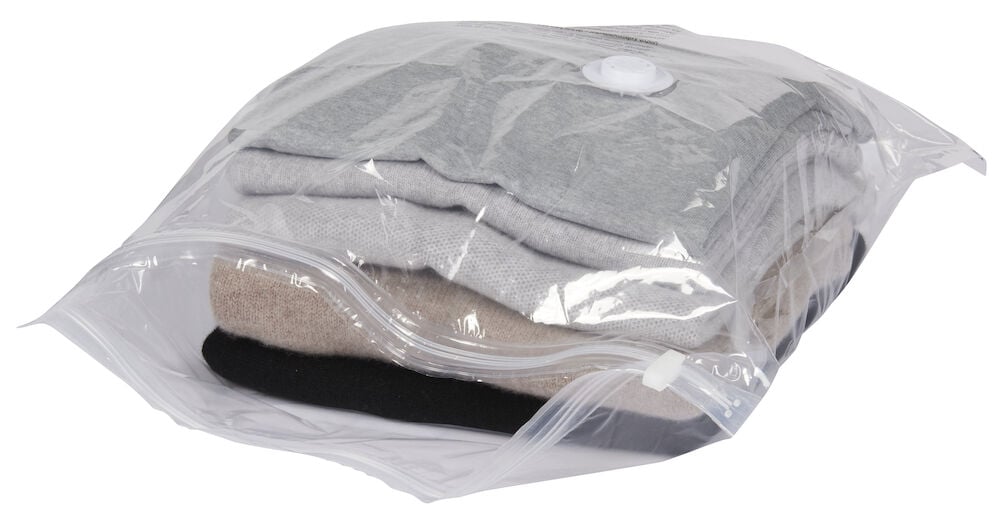 Genomskinlig vakuumpåse med kläder inuti.