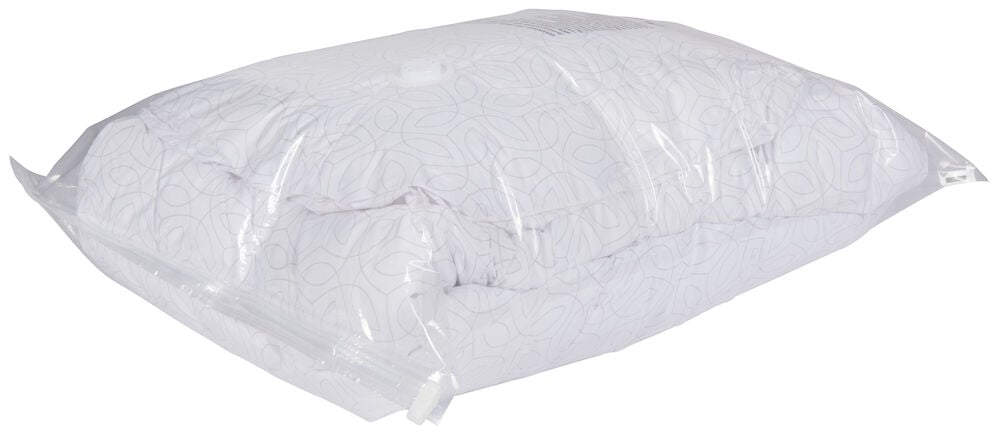 Transparent vakuumpåse med tätt försluten täcke inuti.