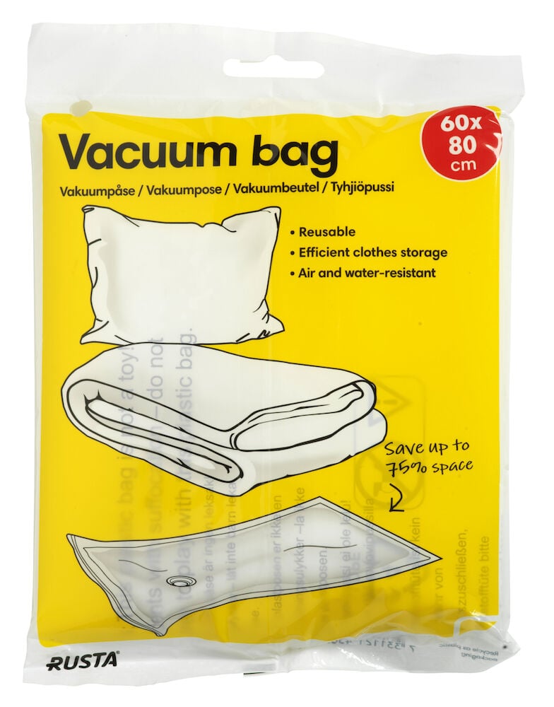 Transparent vakuumpose med illustrasjoner av pute og teppe.