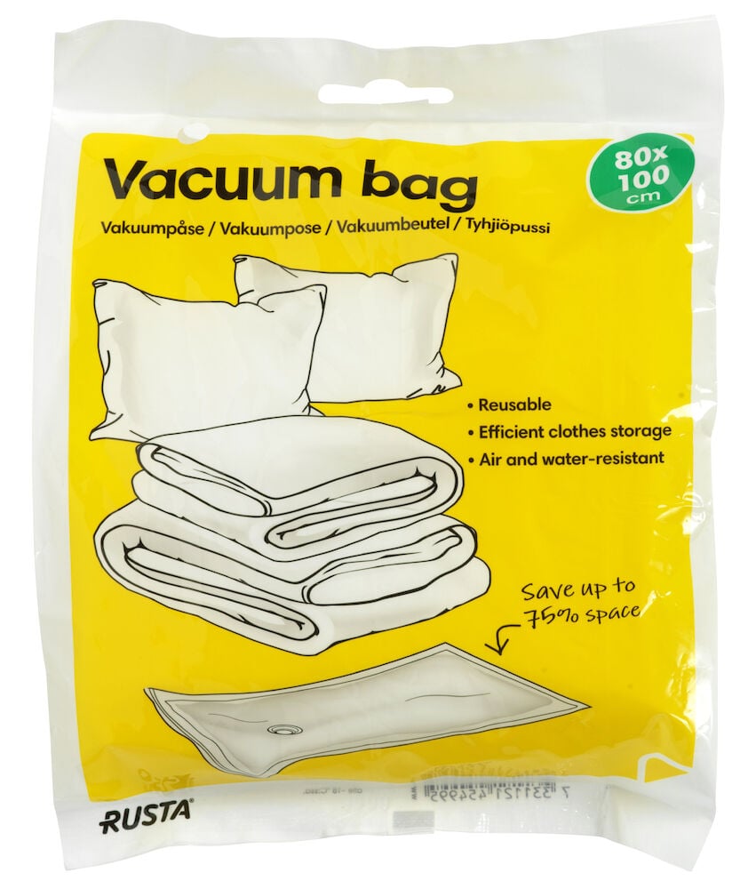 Transparent vakuumpose med illustrasjon av puter og tepper