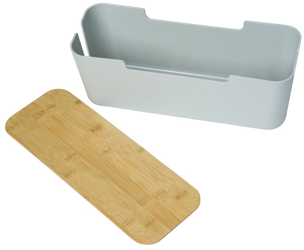 Vit kabellåda i plast med öppet bambulock.