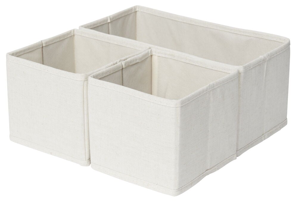 Kolme beigettä taitettavaa säilytyslaatikkoa pellavalookilla.