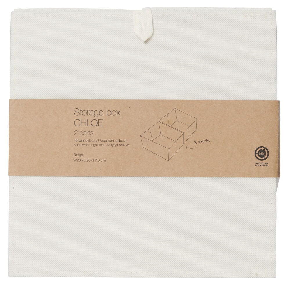 Beige taittuva säilytyslaatikko paperietiketillä.