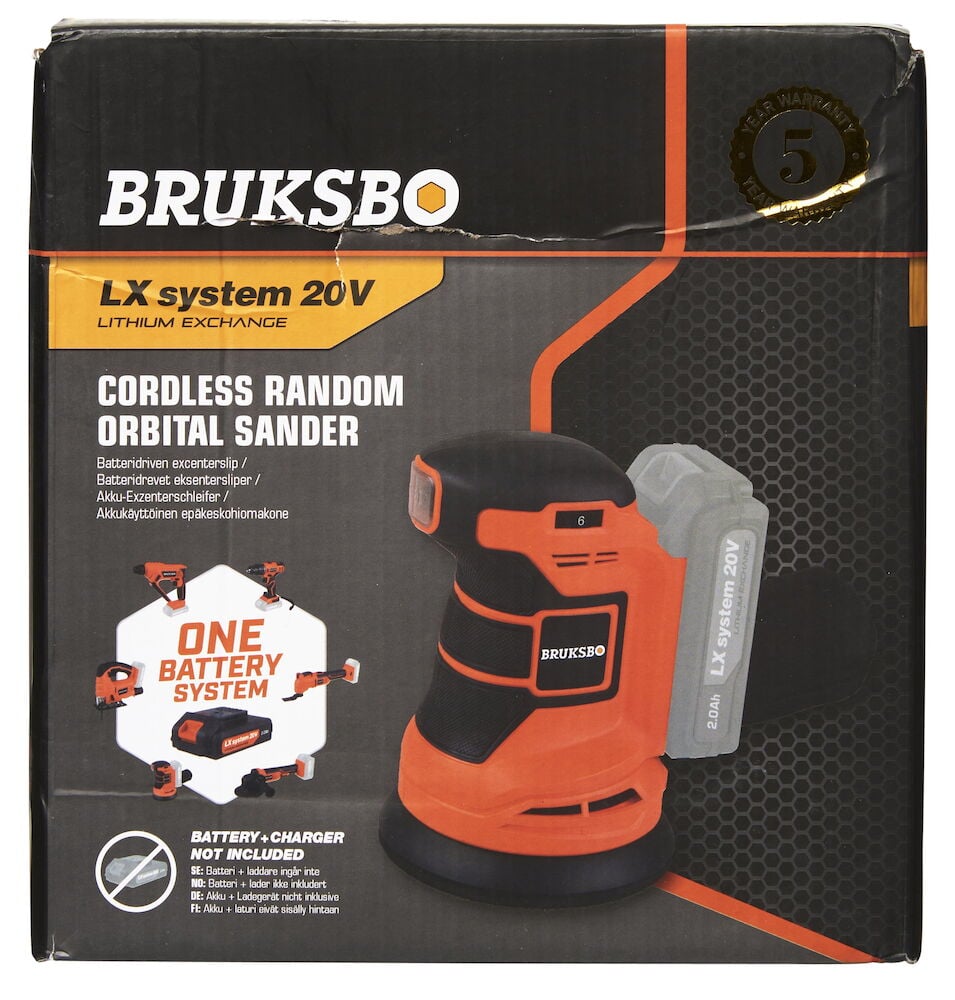 Svart orange excenterslip med batteri på kartongbox.