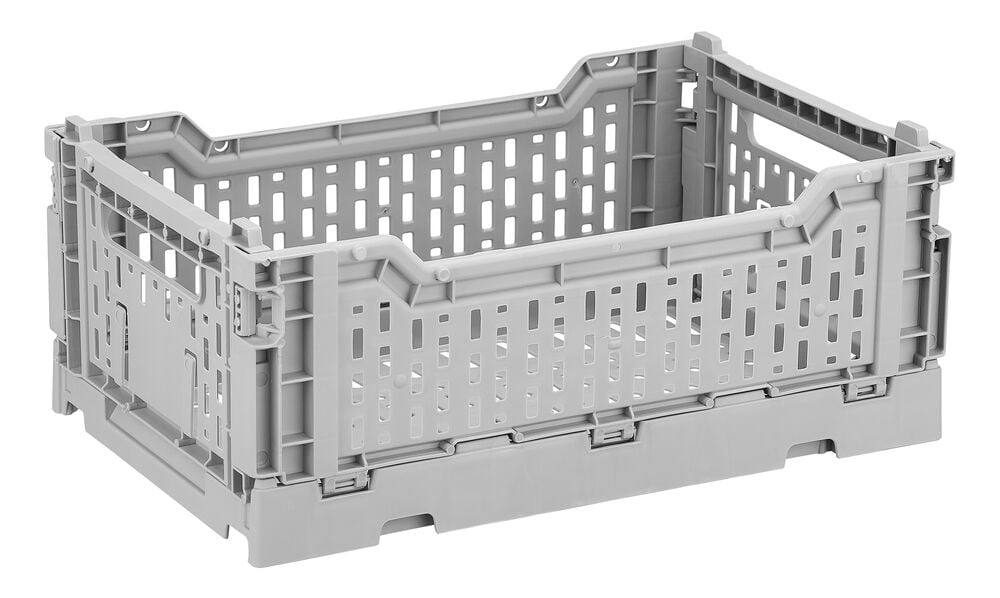 Grå hopfällbar plastback med öppna sidor.