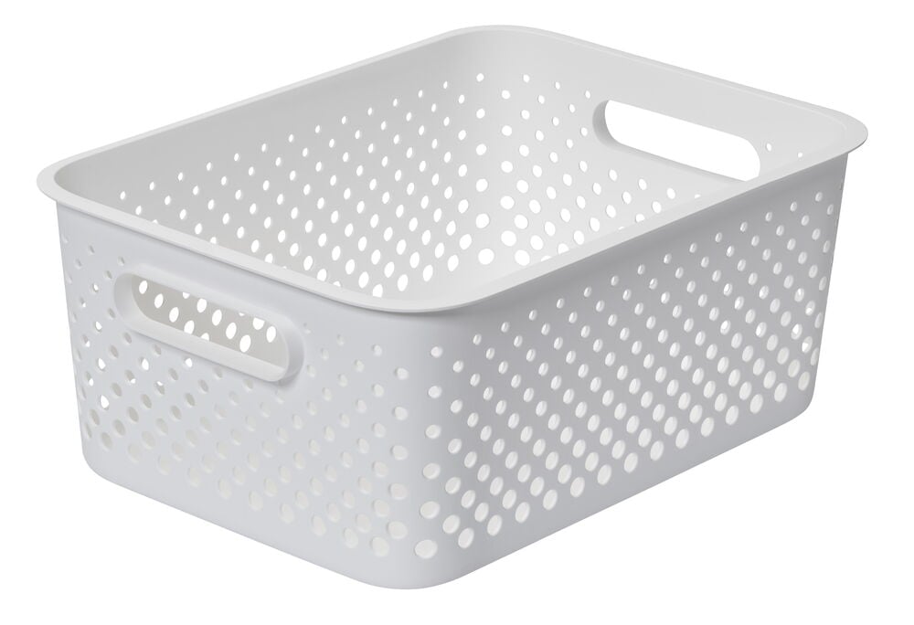 Vit förvaringslåda med hålmönster och inbyggda handtag.