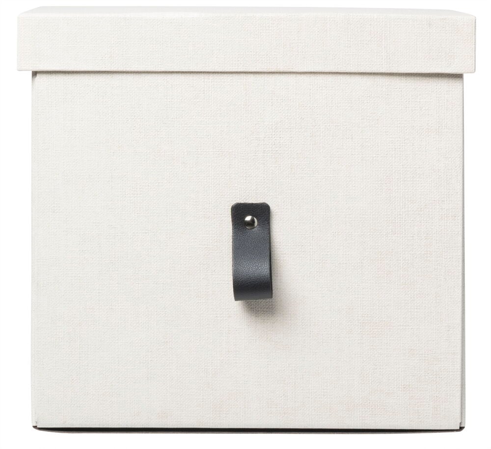 Beige säilytyslaatikko, jossa on kansi ja musta kahva.