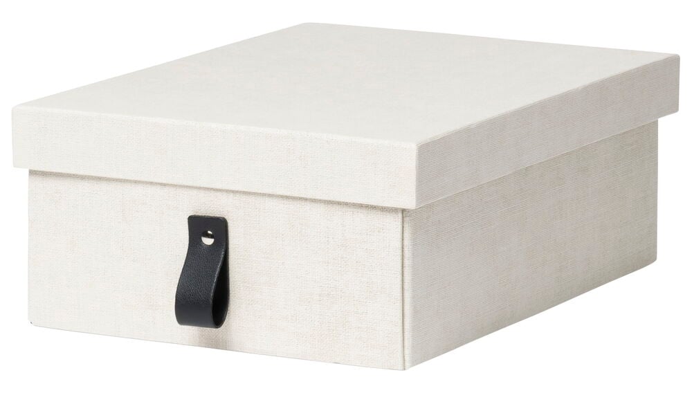 Beige säilytyslaatikko kannella ja mustalla kahvalla.