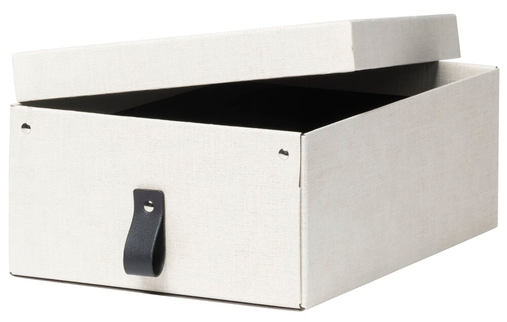 Beige förvaringslåda med lock och brun dekorativ ögla.