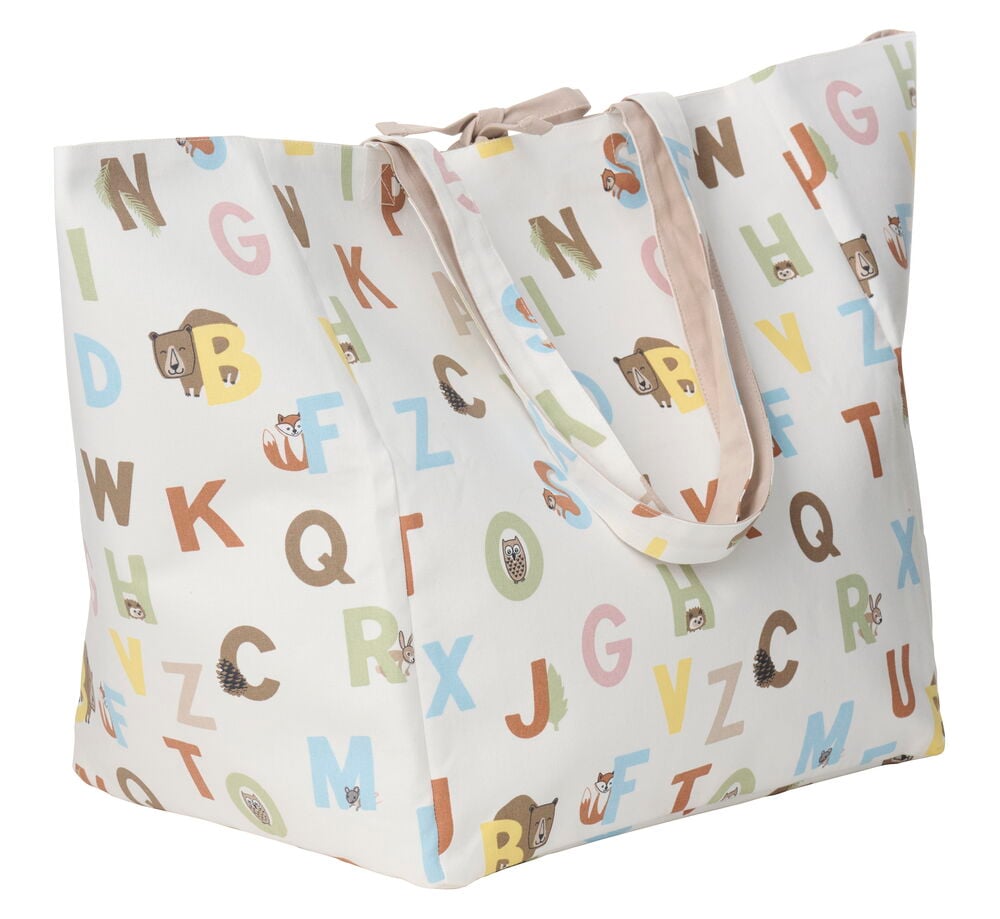 Valkoinen Alphabet kangaskassi, jossa värikkäitä kirjaimia, metsäneläimiä, beigenväriset hihnat ja nauhakiinnitys.