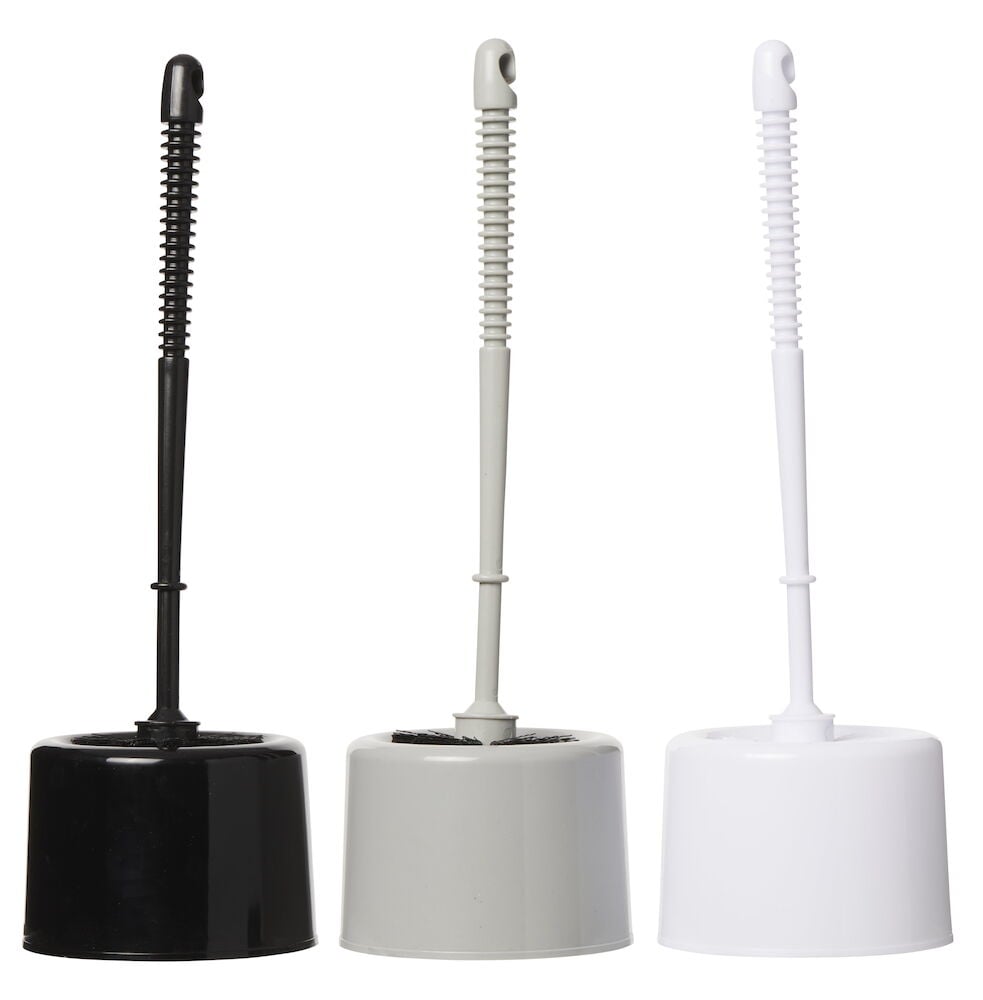 Tre toalettborstar i svart, grått och vitt.