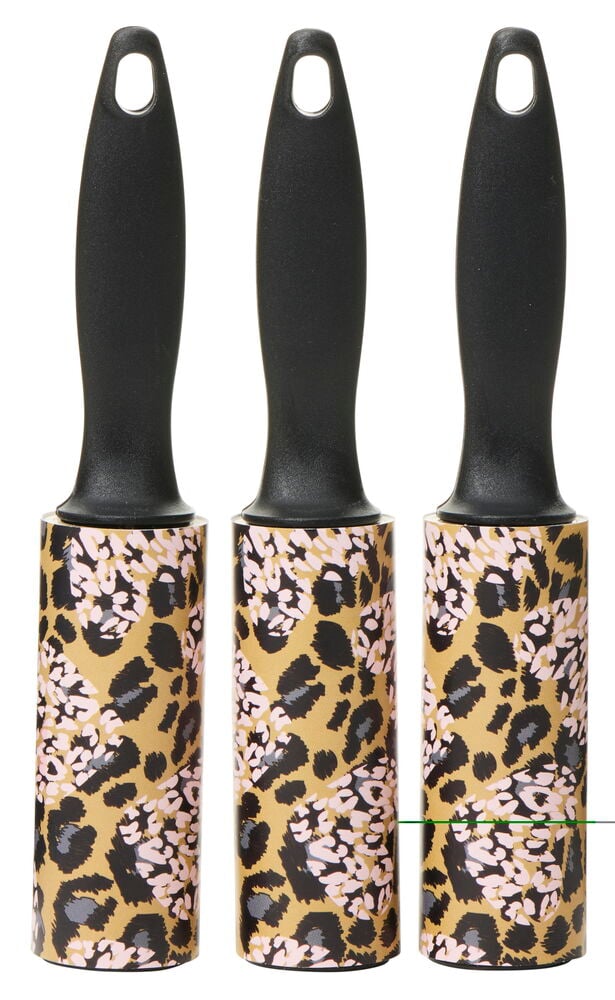 Tre klädvårdsrullar med leopardmönstrad design.