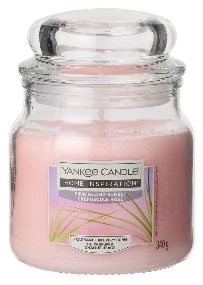 Vaaleanpunainen Tuoksukynttilä Yankee Candle 340 g Pink Island Sunset kirkkaassa lasipurkissa kannella.