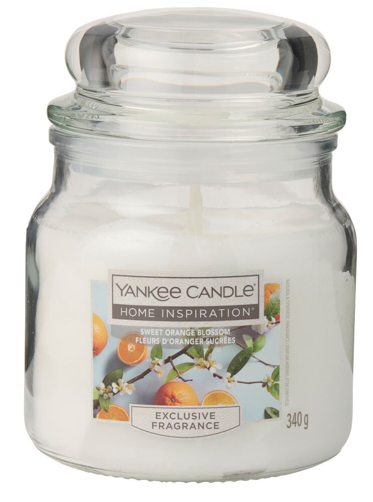 Duftlys Yankee Candle 340 g Sweet Orange Blossom, hvit voks i klar glasskrukke.