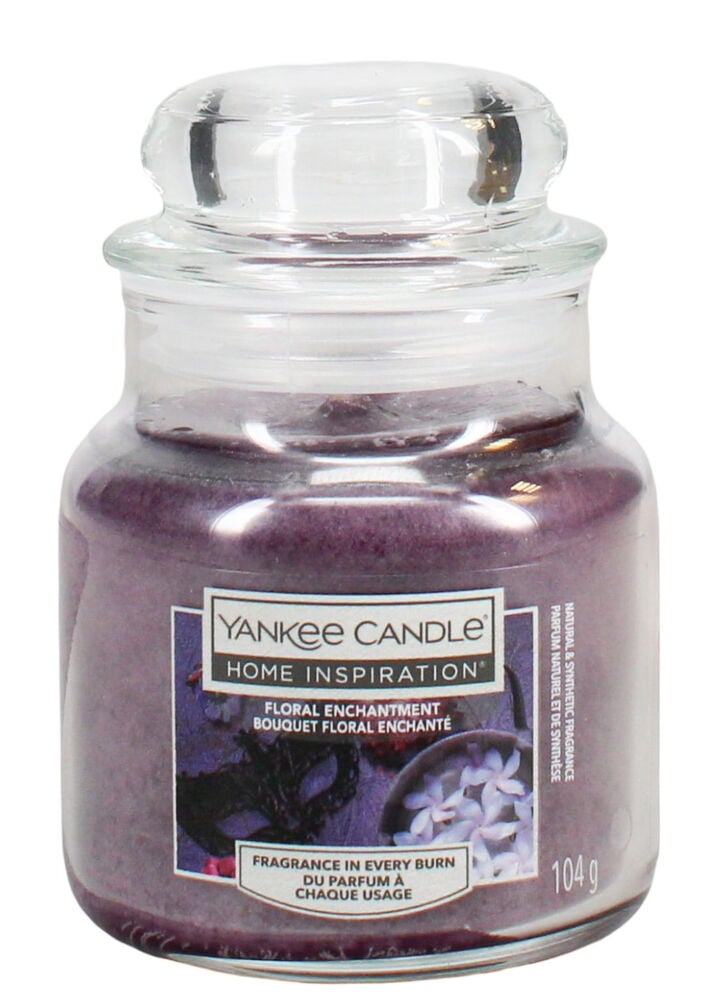 Lilla duftlys i glasskrukke med lokk.