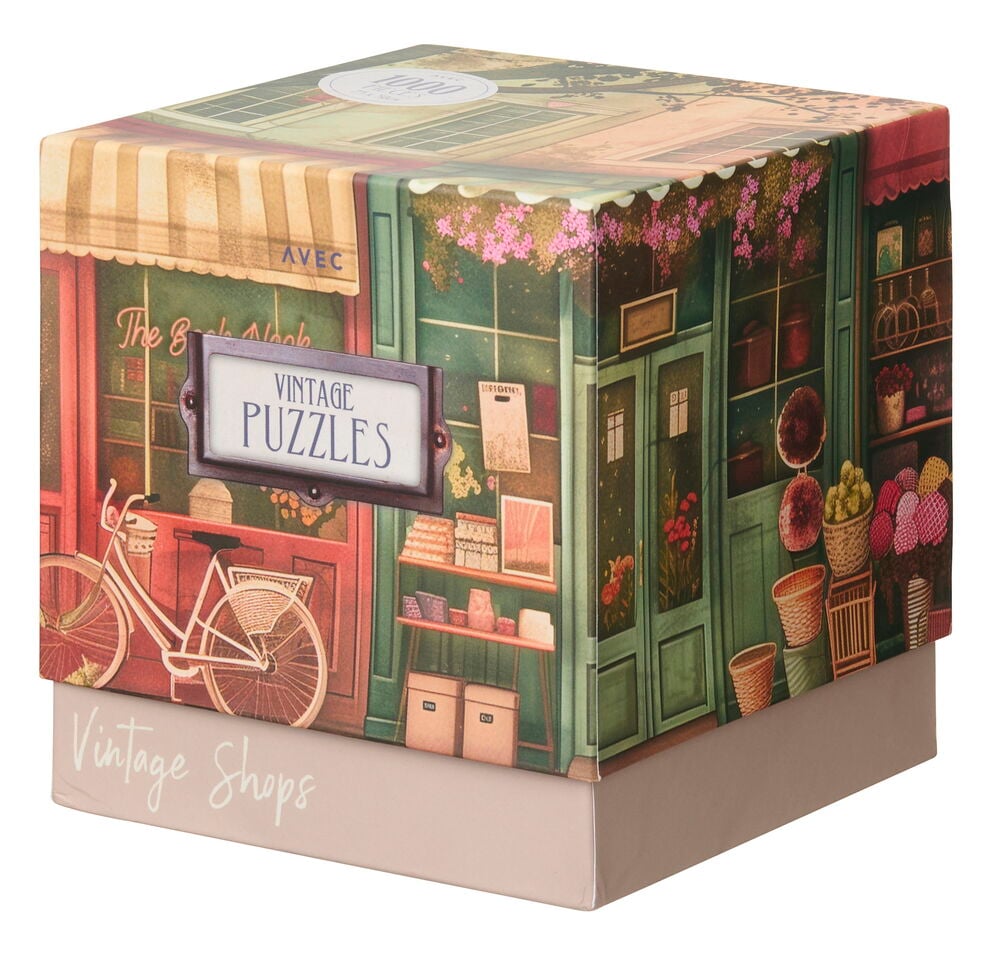 "Vintage Shops" Pusselask med "Vintage Puzzles"-etikett och illustration av två butiker.