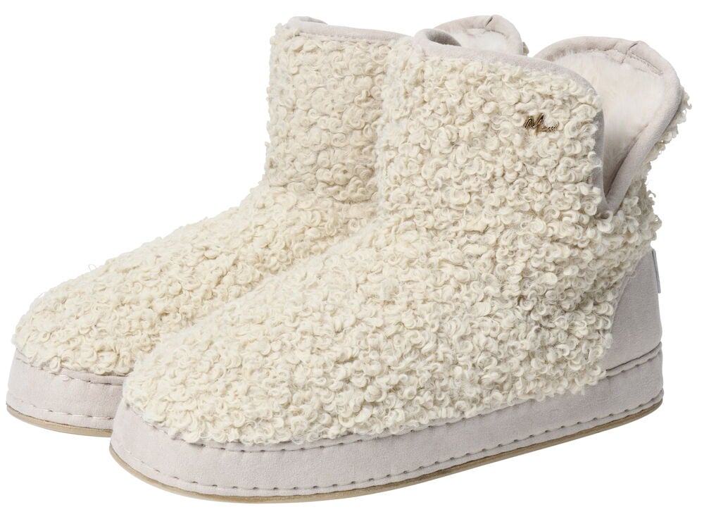 Varma vita innetofflor med hög mjuk krage.