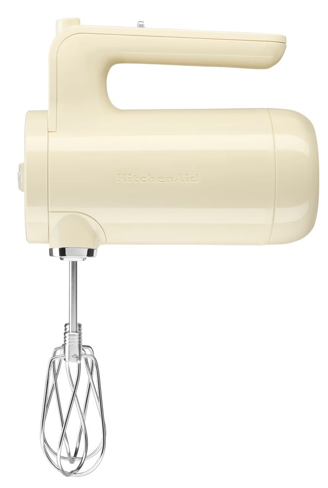 Ledningsfri kremfarget elektrisk visp med metallvisp.