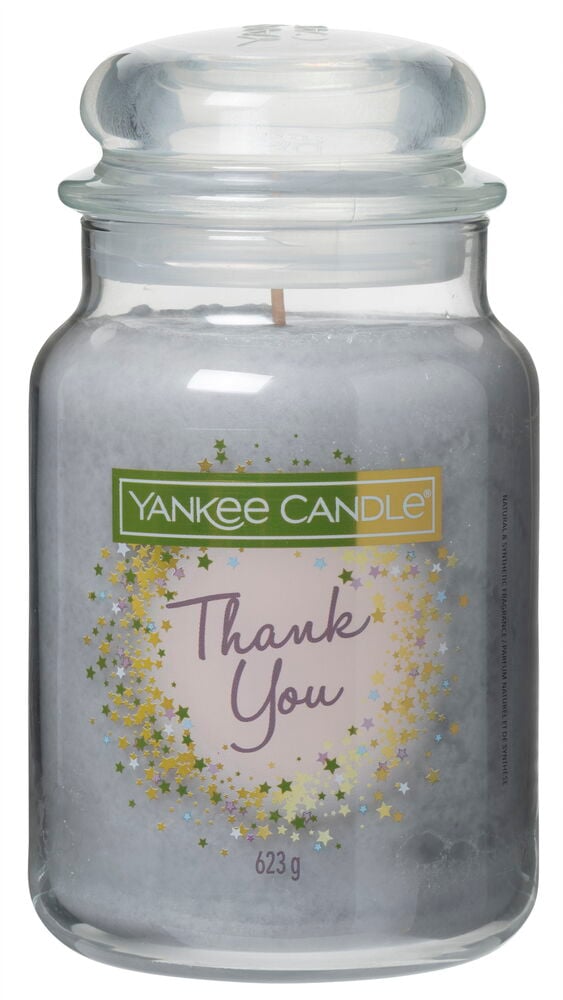 Blå duftlys i glasskrukke med teksten Thank You.