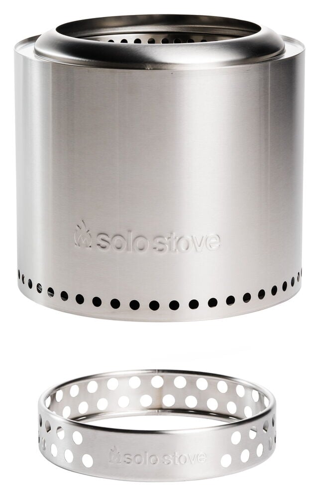 Rund eldstad i rostfritt stål med perforerad bas.