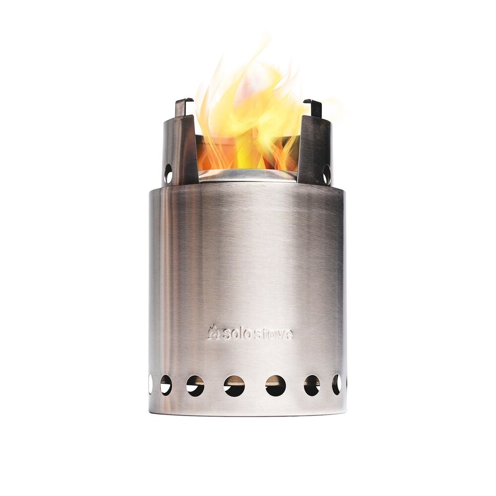 Kompakt rustfri campingskomfyr med synlig flamme.