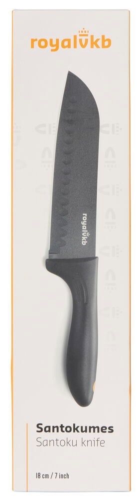 Musta santoku-veitsi ergonomisella kahvalla pakkauksessa.