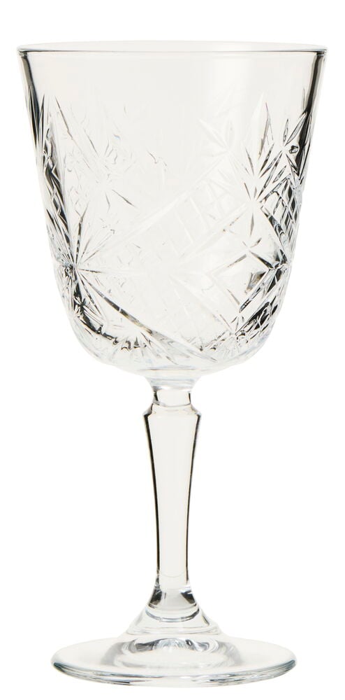 Ett retro vinglas av transparent glas med mönster.