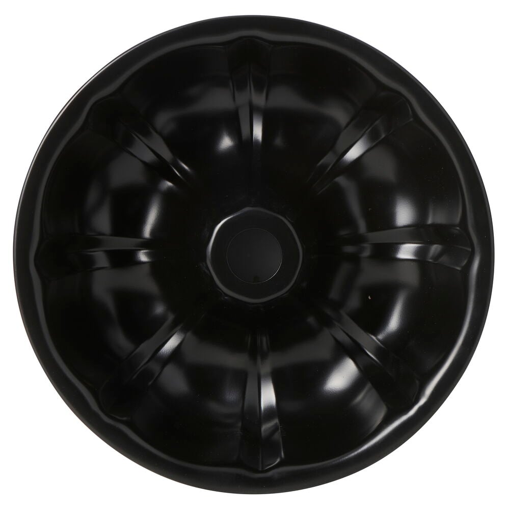 En svart, rund Charlotte kakeform Pyrex Ø25,5 cm Wave med riflede sider og et sentralt rør.