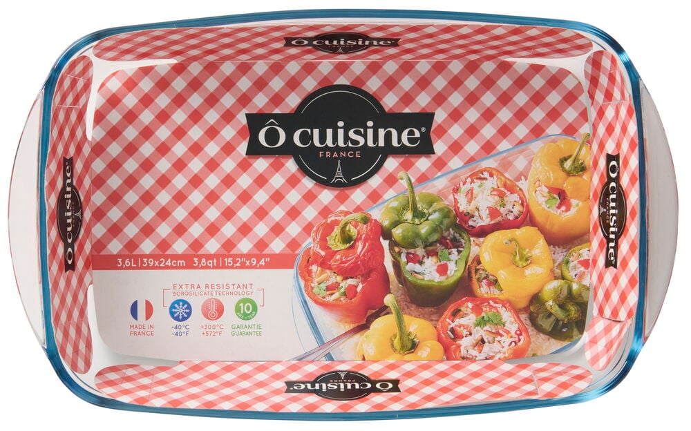 Rechteckige klare Glas-Ofenform von Ô cuisine mit blauem Rand, zeigt rot karierten Einsatz mit gefüllten Paprika.