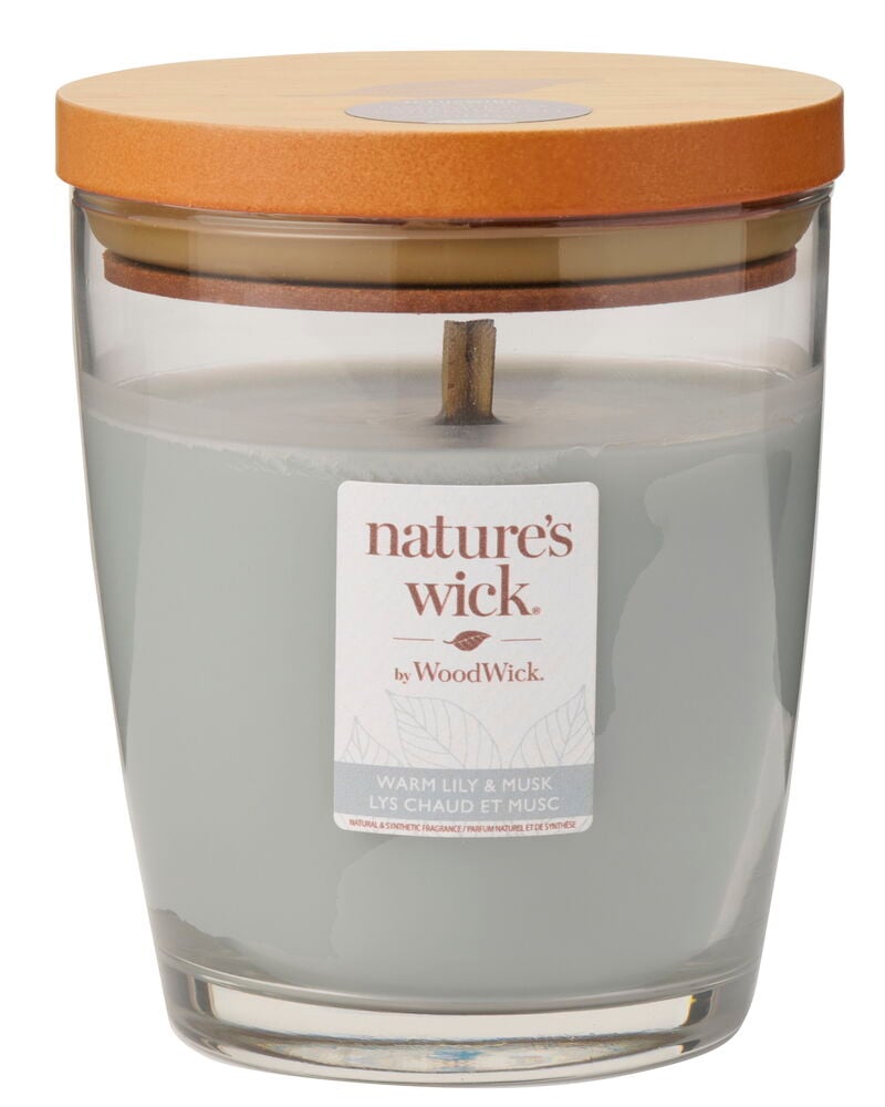 WoodWick Warm Lily & Musk doftljus, grå vax i en klar glasburk med trälock.