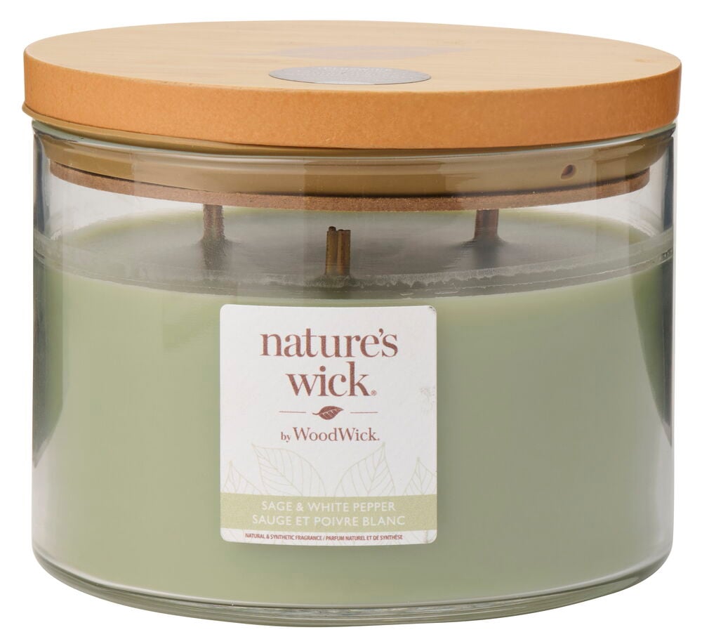 Doftljus WoodWick 433 g Sage & White Pepper, ljusgrönt i en klar glasburk med trälock.