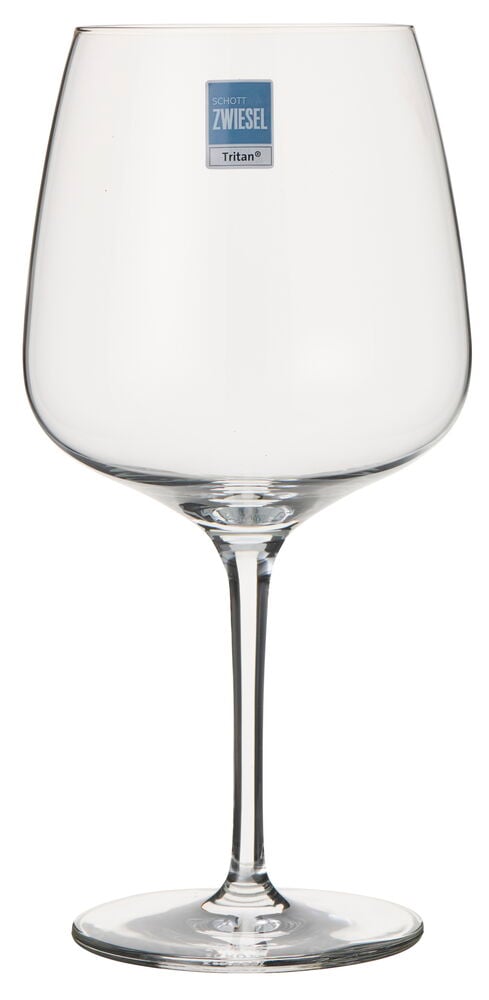 Kirkas Gin & Tonic -lasi, jossa on leveä malja, ohut jalka ja pyöreä pohja, edestäpäin.